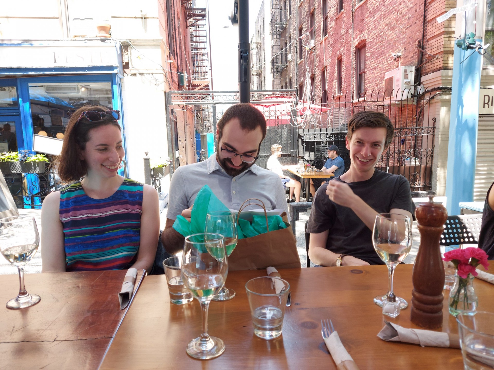 Ari unwraps his gift - first there is a card to read though! Aryeh Brill's Graduation - 1