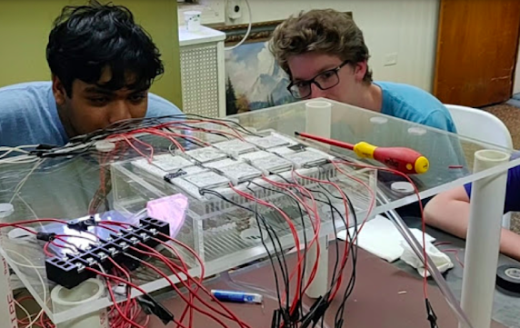 image of students testing cloud chamber